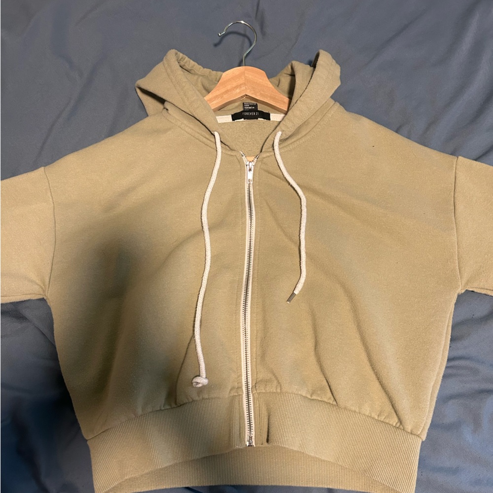 green zip up